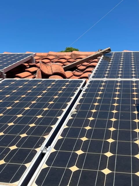 Roof maintenance around solar panels in Sydney